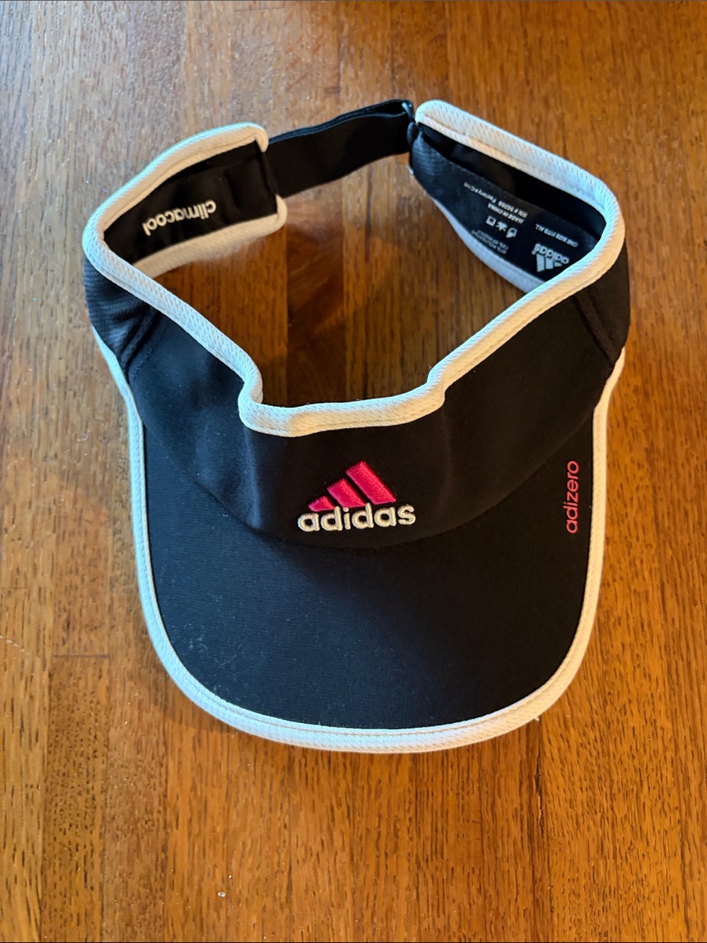 adidas woman’s Black and Pink Adizero Visor